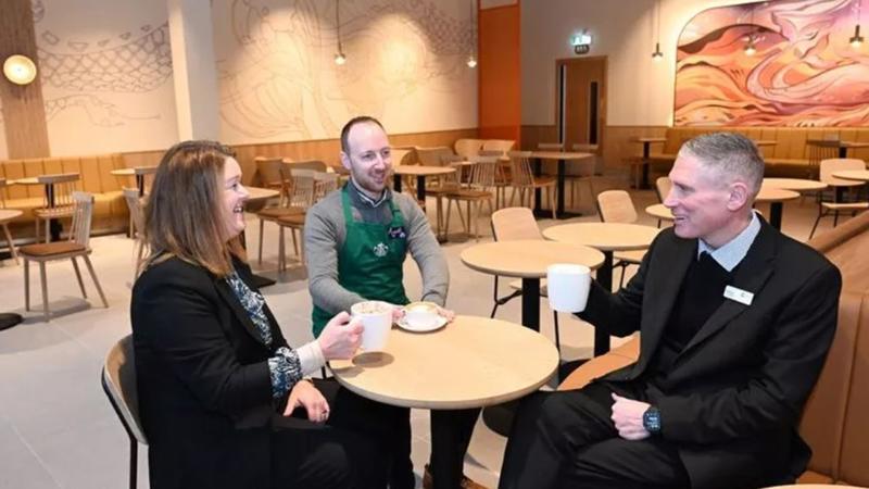 Centre director Patrick Robbertze with Starbucks Employees